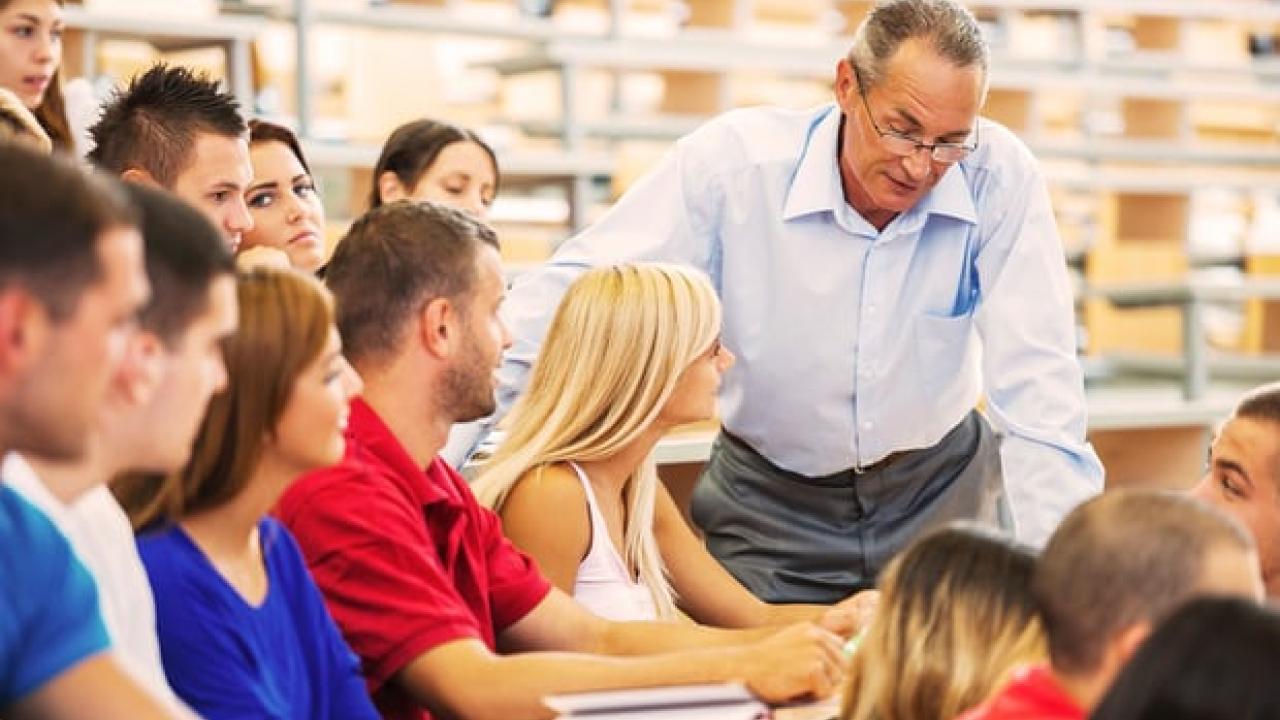 professor helping female student